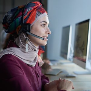 Operator in headphones in call center